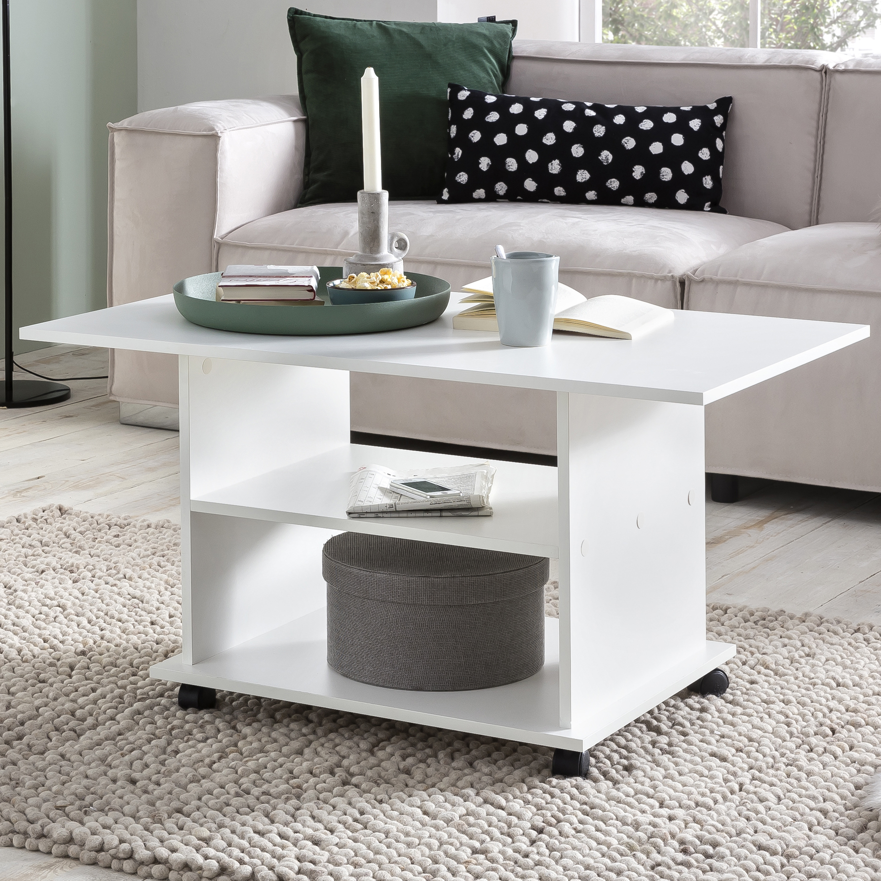 Designerski stolik kawowy biały obrotowy na kółkach | kolor biały | 95x51x54,5 cm